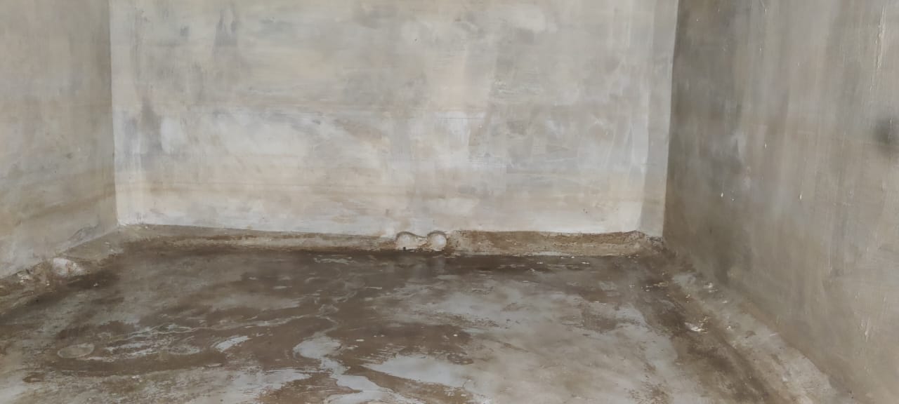 India Tank Cleaners cleaning underground sump in Chennai using vacuum suction and safety gear."